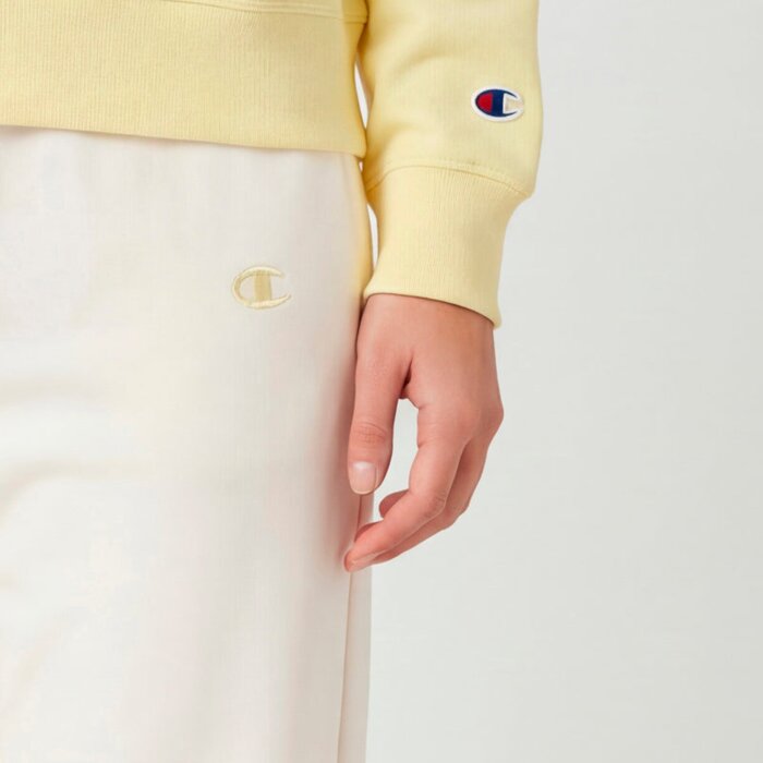 Tepláky CHAMPION krémové Flare Pants 118742 YS084 EGT