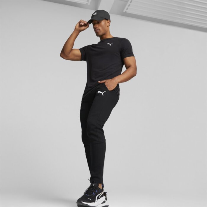 Tepláky PUMA čierne EVOSTRIPE Core Pants 585814 01